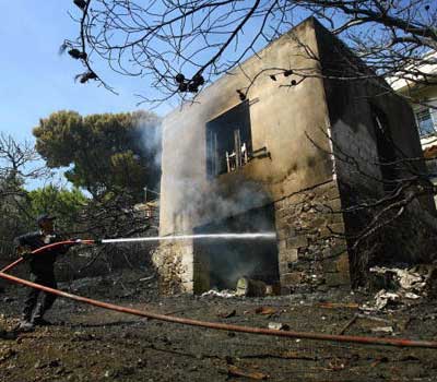 Количество жертв в результате лесных пожаров в Греции достигло 50 человек (фото 3 из 3)